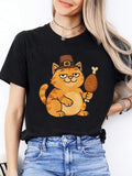 Thanksgiving Day Ladies' Round-Neck Fashionable Casual T-Shirt | Orange Cat Wearing A Hat And Holding A Turkey Leg In A Cute Cartoon Style, Short Sleeve, All-Season Wear