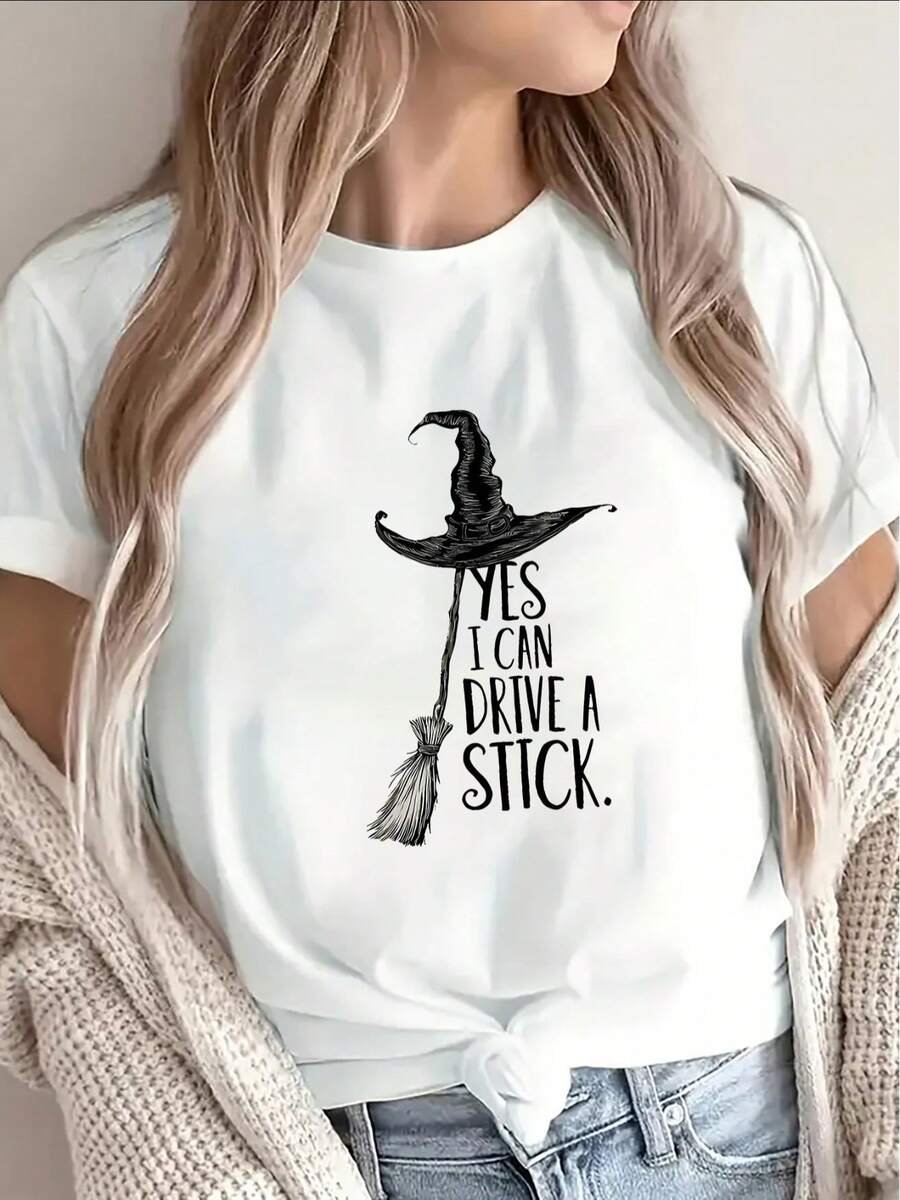 Black T-Shirt Featuring A Design Of A Witch'S Hat And Broom With The Phrase, "Yes, I Can Drive A Manual Transmission".Made From Lightweight And Durable